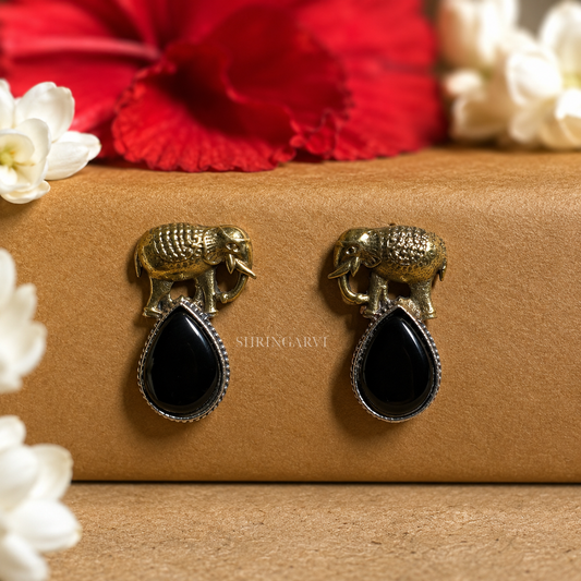 Black Girija dual tone oxidised brass studs with antique gold elephant motif and black Monalisa stone by Shringarvi