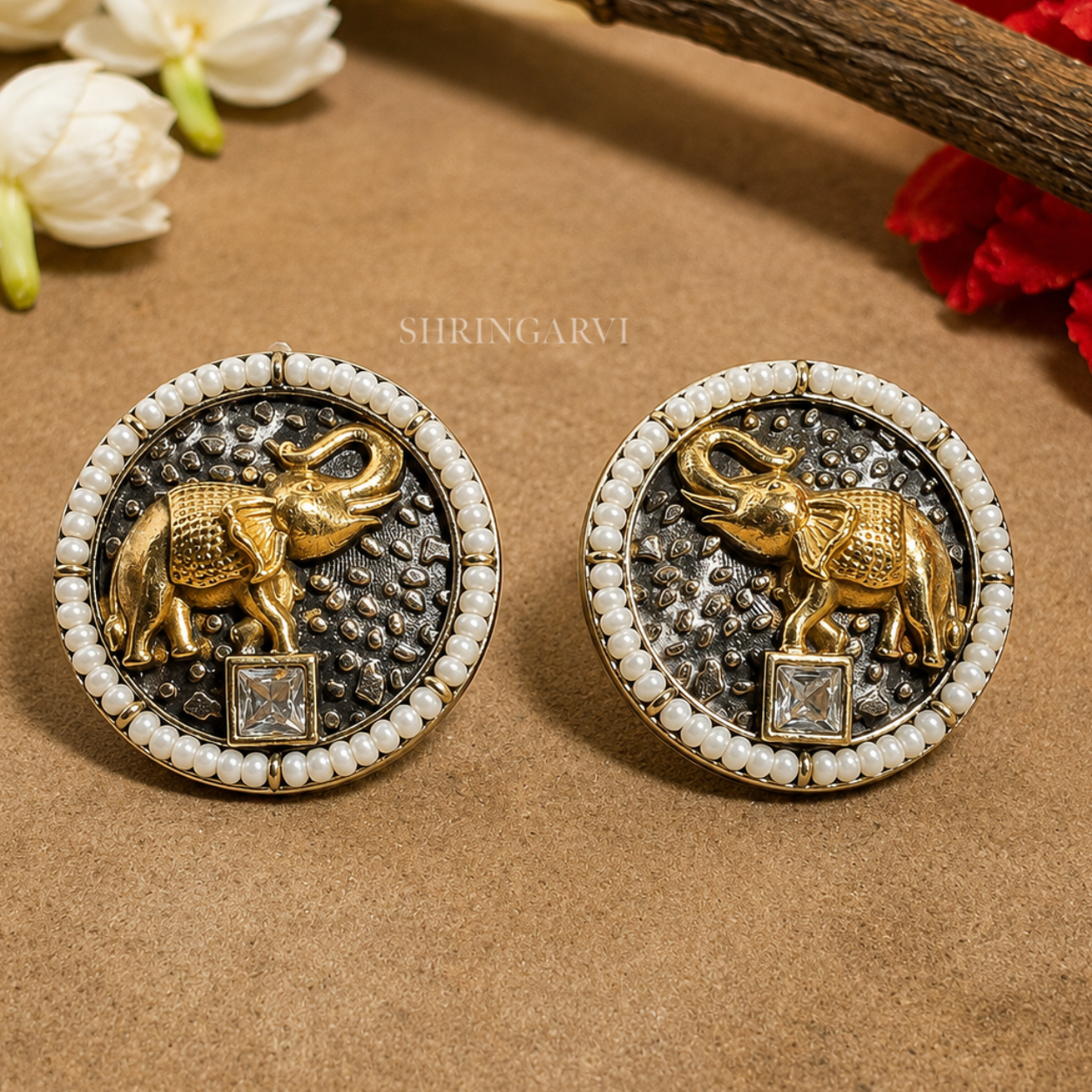 Oxidised brass Crystal Vinayak studs with antique gold elephant motif, crystal-inspired accent and pearl border by Shringarvi