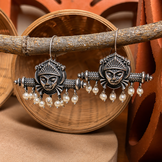 Durgamya Danglers oxidised silver statement earrings featuring Goddess Durga motif with pearl drops and traditional handcrafted detailing.