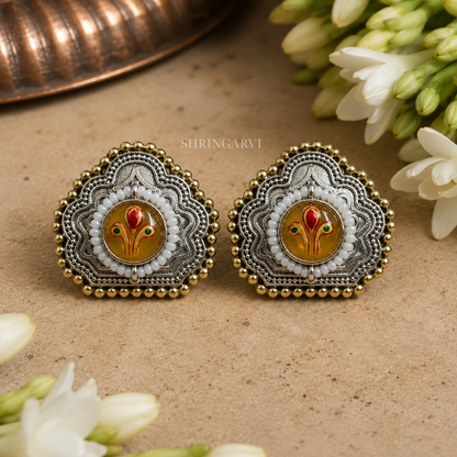 Dual Tone Oxidised Brass Earrings with Meenakari motifs on a golden colour monalisa stone.
