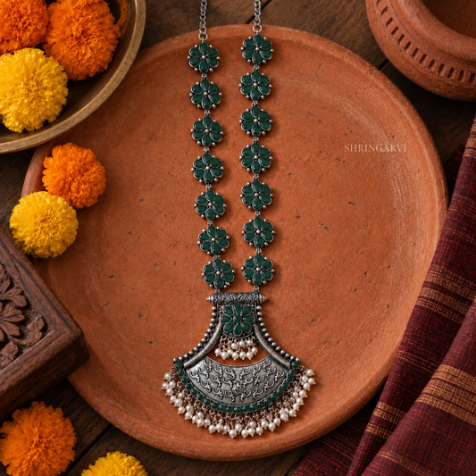 green floral oxidised long necklace with statement engraved pendant and bead detailing. Perfect ethnic jewellery for handloom sarees and kurtas.