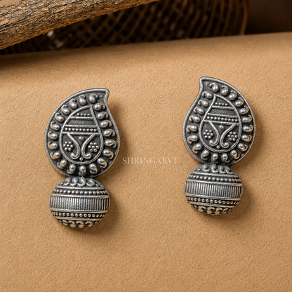 Kairi Studs in oxidised brass featuring a traditional mango-shaped (kairi) motif with intricate handcrafted detailing