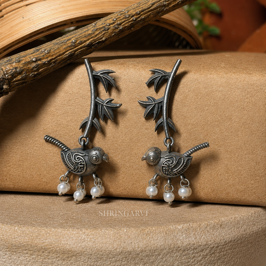Koyal Pearl Danglers in oxidised brass with bird motif and pearl drops for casual and festive wear