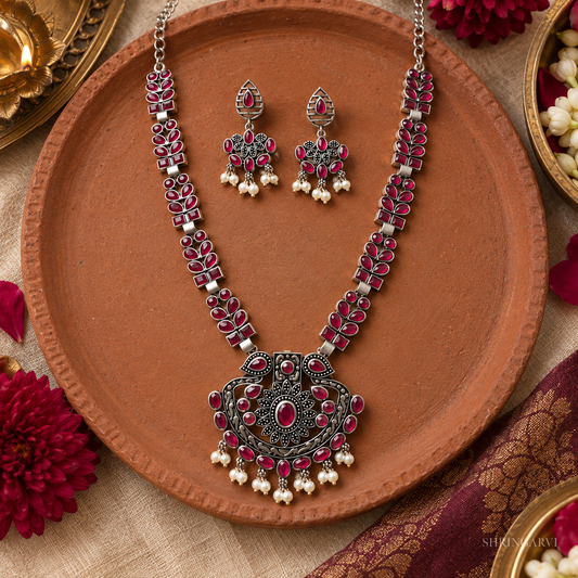 Magenta oxidised long necklace set with matching earrings and pearl drops