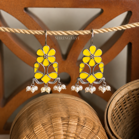 Handcrafted oxidised brass Meenakari Morni danglers featuring Yellow enamel detailing with pearl cluster drops for festive and ethnic wear.