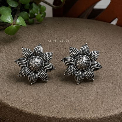 Phulwa floral oxidised brass stud earrings with antique silver finish for everyday wear.