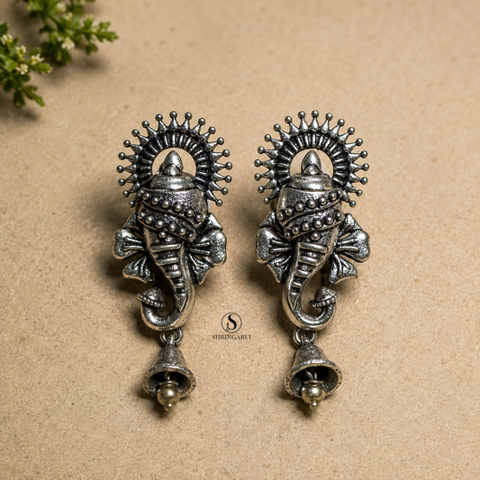 Vinayaki Studs oxidised silver earrings featuring Ganesha-inspired elephant motif with traditional bell detailing for ethnic and festive wear.